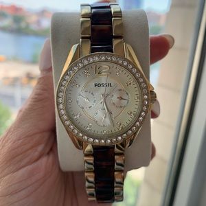 Gold Tortoise fossil watch with diamond rim